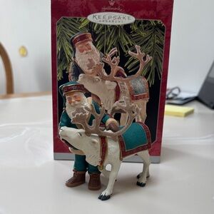 Hallmark Keepsake Santa and Reindeer Ornament - hand signed by the artist.